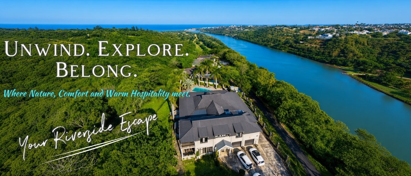 Aerial view of Eagle's Roost above the Umzimkulu River, with the beach and ocean beyond
