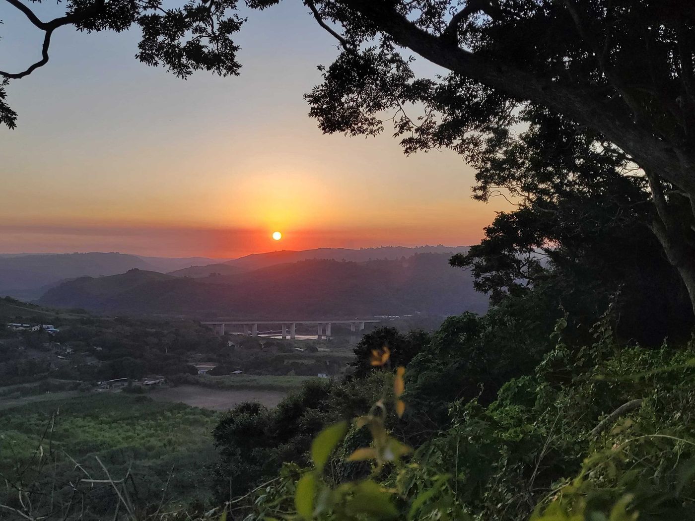 Sunset over the river valley and the N2 bridge